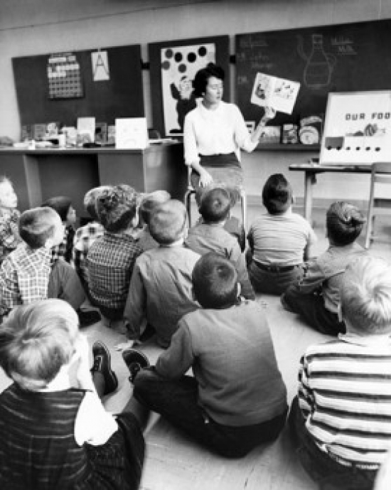 Teacher Teaching Students in a Classroom Poster Print 18 x 24 in.
