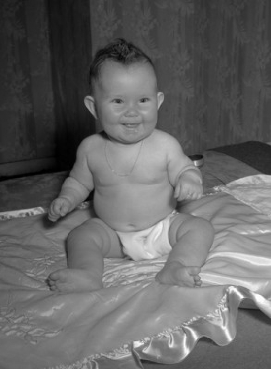 Baby Boy Sitting on Bed Poster Print - 18 x 24 in.