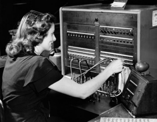 Side Profile of a Female Telephone Operator Operating a Switchboard Poster Print - 18 x 24 in.