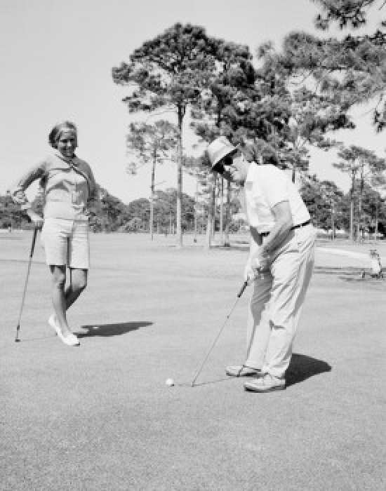 Couple Playing Golf Poster Print - 18 x 24 in.