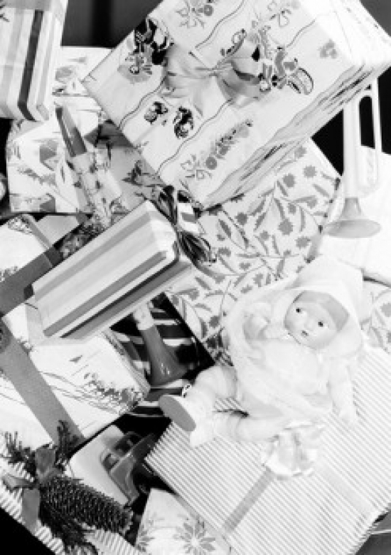 Doll Lying on Gift Boxes Poster Print - 18 x 24 in.