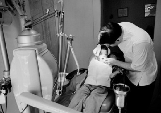 Dentist Examining Boys Teeth Poster Print - 18 x 24 in.