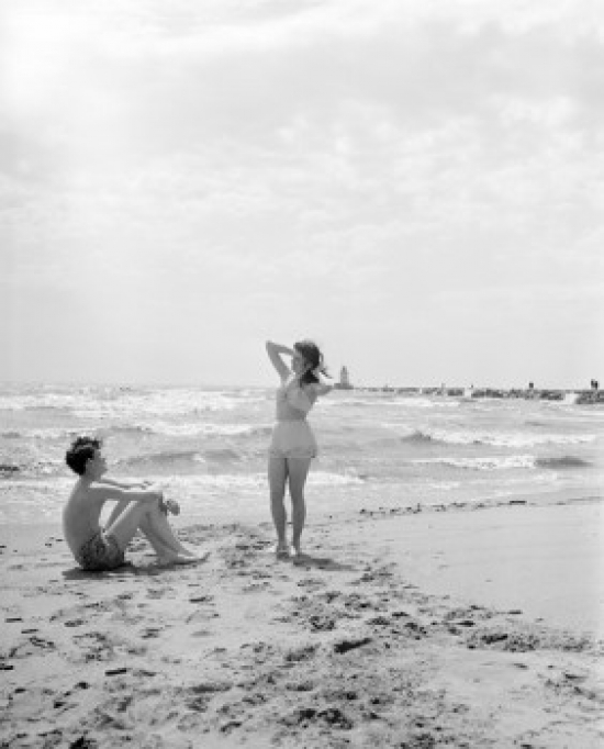 Young Couple on Beach Poster Print - 18 x 24 in.