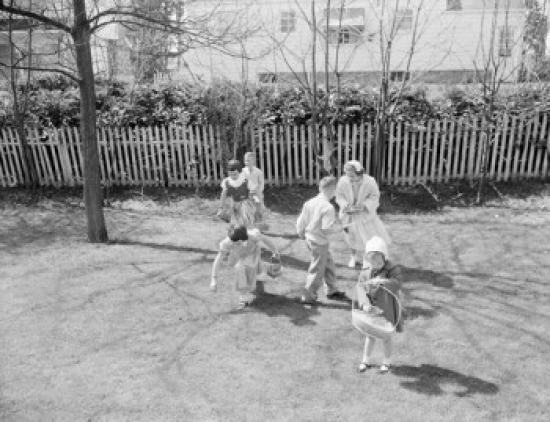 Children Hunting for Easter Egg Poster Print - 18 x 24 in.