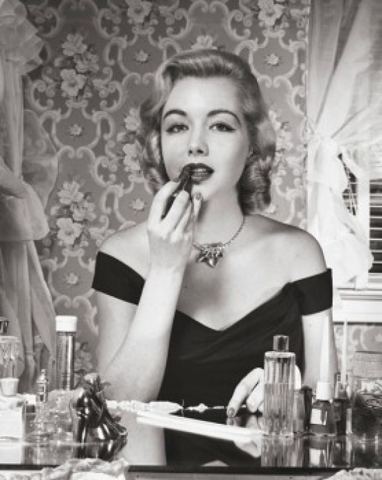 Portrait of a Young Woman Applying Lipstick Poster Print - 18 x 24 in.