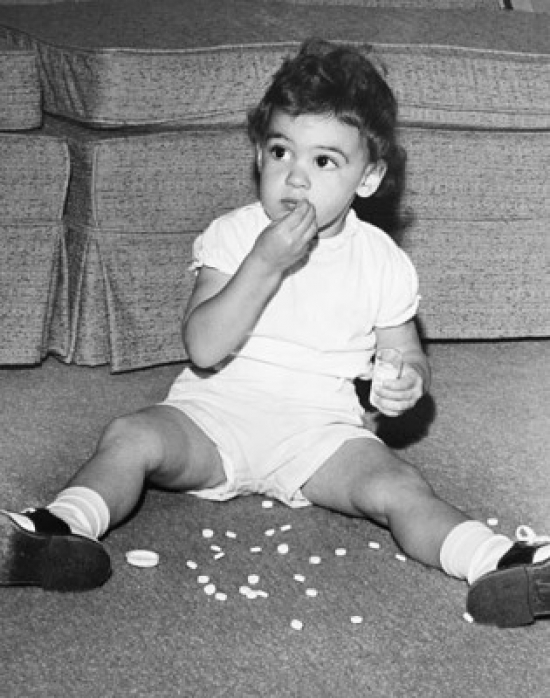 Boy Eating Pills Poster Print - 18 x 24 in.