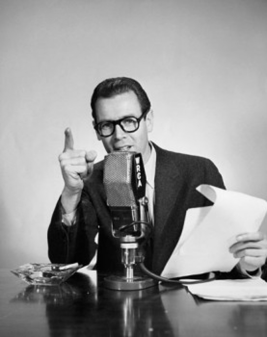 Mid Adult Man Talking on a Microphone Poster Print 18 x 24 in.