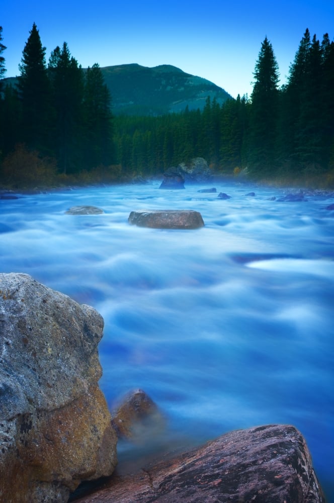 DPI1801593LARGE Maligne River Through The Rocky Mountains Poster Print by Corey Hochachka, 22 x 34 - Large