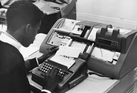 SAL9901872 High School Student Learning to Operate a Keypunch Machine Poster Print - 18 x 24 in.