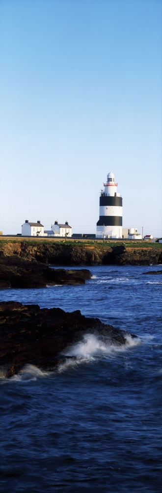 DPI1807531 Hook Lighthouse Co Wexford Ireland - Lighthouse On The Celtic Sea Poster Print by The Irish Image Collection, 12 x 37