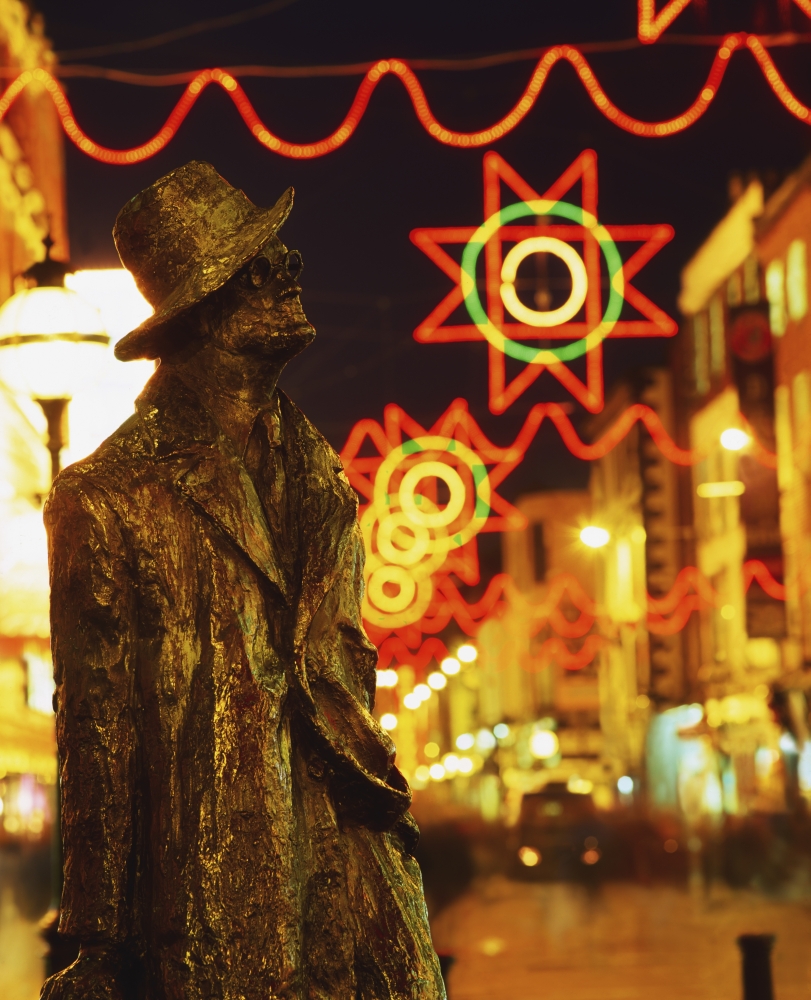 Dublin Co Dublin Ireland - Sculpture of James Joyce with Christmas Decorations in Background Poster Print by The Irish Image Collection, 13 x 17