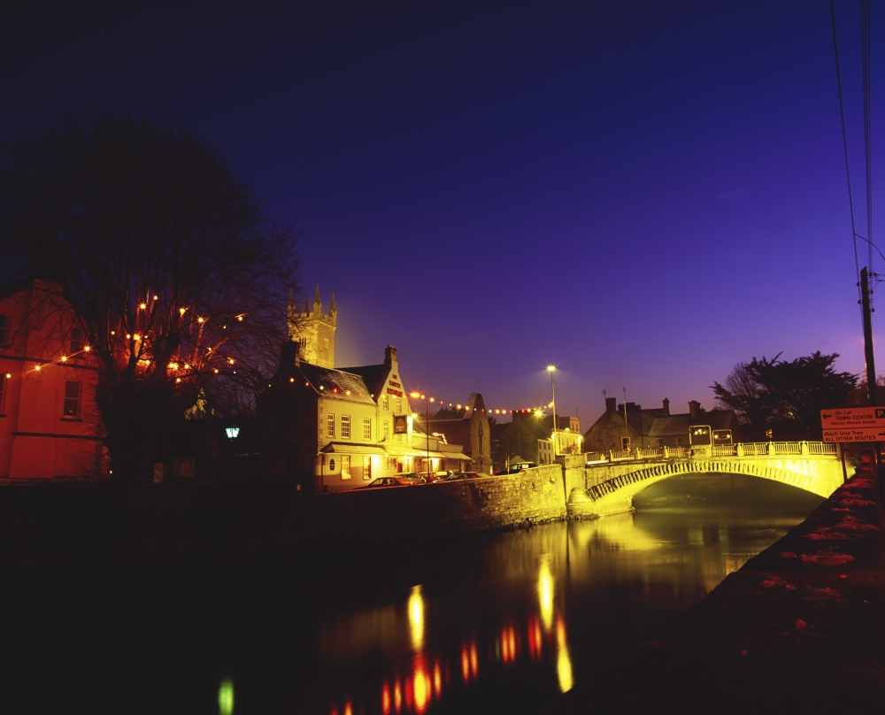 Ennis Co Clare Ireland - Bridge Over Placid River Poster Print by The Irish Image Collection - 17 x 13