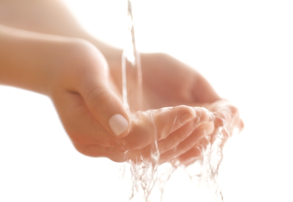 Water in Hands Poster Print by Chris & Kate Knorr
