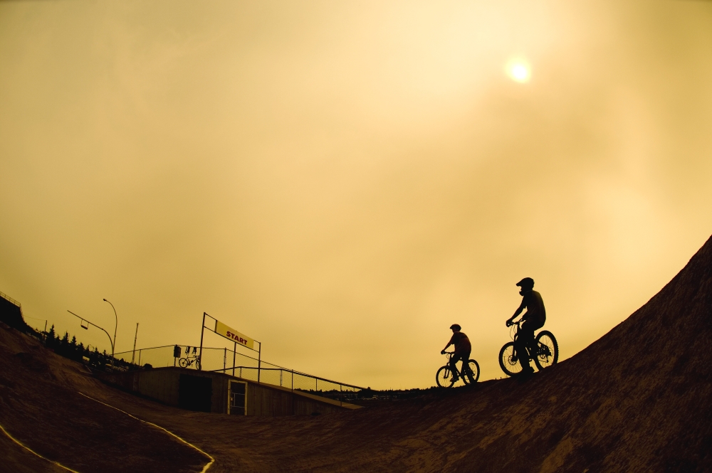 Two Cyclists Poster Print by Corey Hochachka, 34 x 22 - Large
