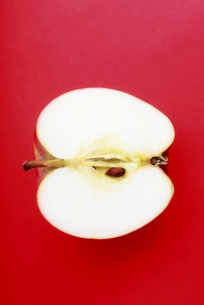 Half An Apple On Red Background Poster Print by Ron Nickel - 12 x 18