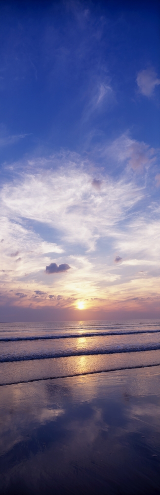 Sunsets Over The Beach Magheraroarty Co Donegal Ireland Poster Print by The Irish Image Collection - 12 x 37