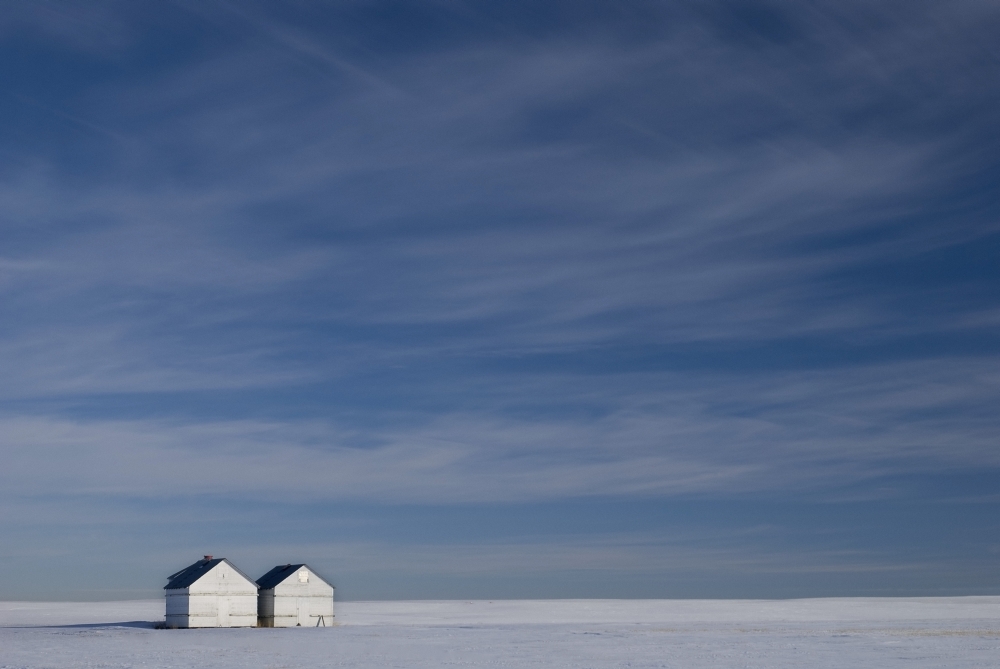 DPI1846081LARGE Hussar Alberta Canada - Two Small Farm Buildings in Flat Winter Landscape Poster Print, Large - 34 x 22