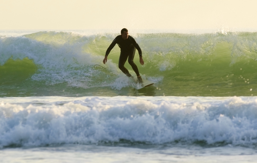 Surfer Catching A Wave Poster Print - 17 x 11