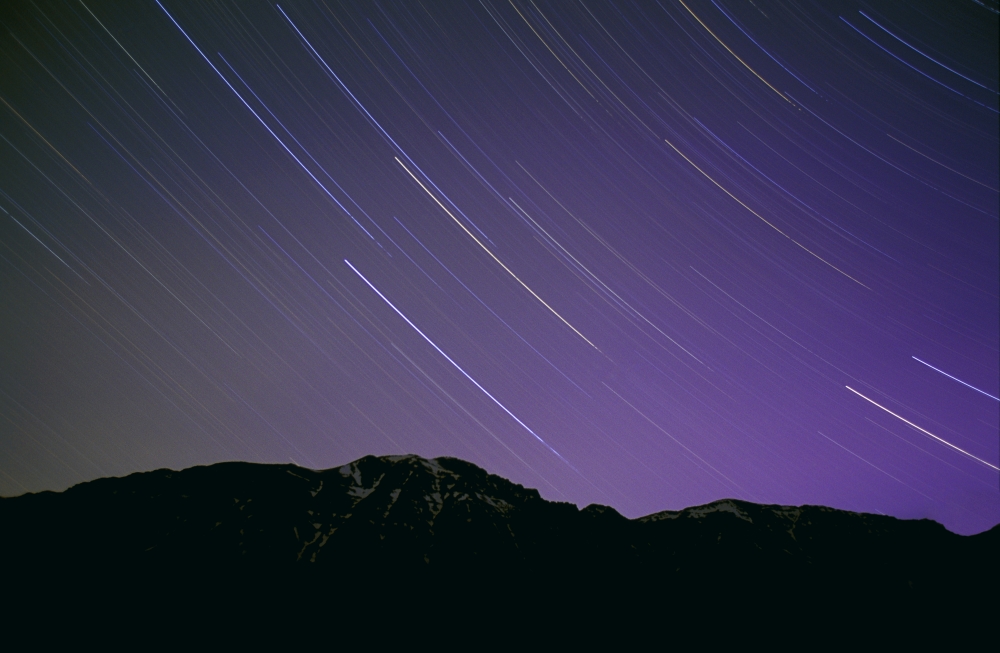 Star Trails in Nights Sky Poster Print - 17 x 11 in.