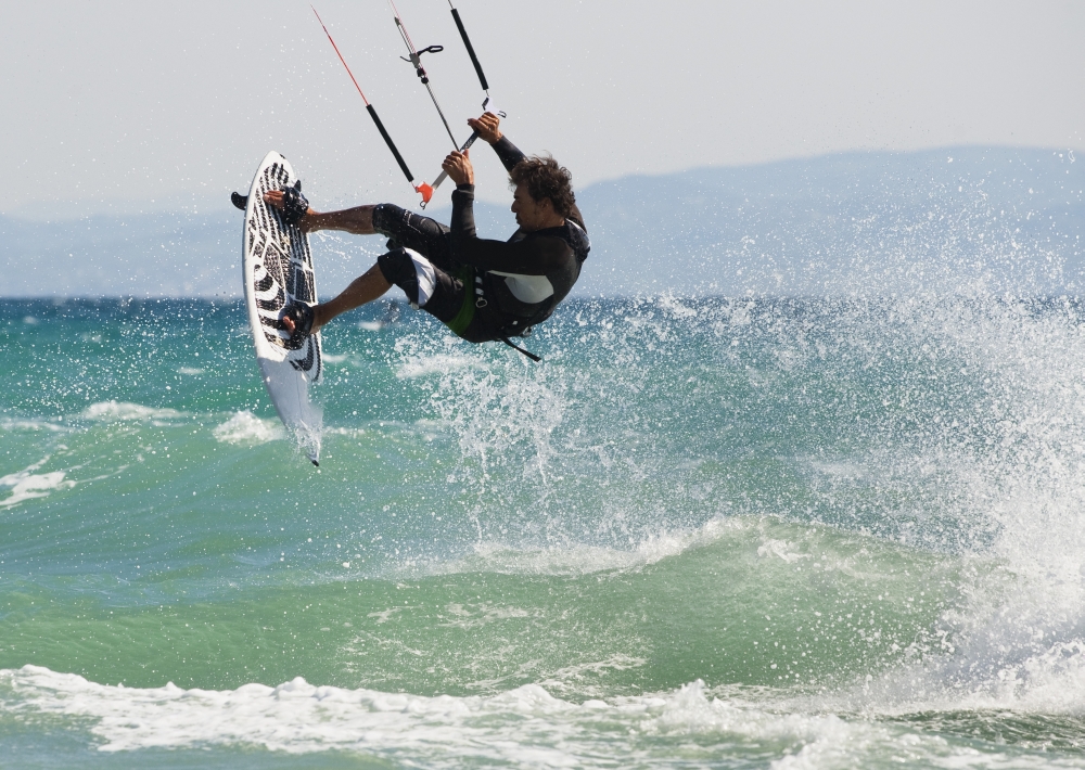 DPI1877279 A Man Kitesurfing Off Dos Mares Beach in Front of Hotel Dos Mares - Tarifa Cadiz Andalusia Spain Poster Print, 18 x 13