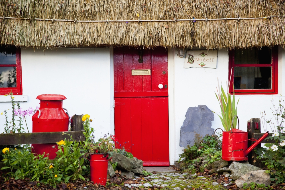 DPI1936723 Traditional Irish Cottage with A Red Door & Red Decorative Items - Currabinny County Cork Ireland Poster Print, 19 x 12