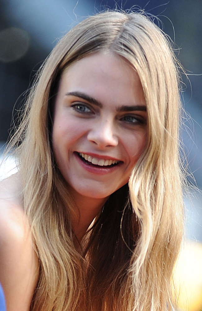 Cara Delevingne On Location for Dkny Photo Shoot Times Square New York Ny October 14 2013 Photo by Kristin Callahan Photo Print, 8 x 10