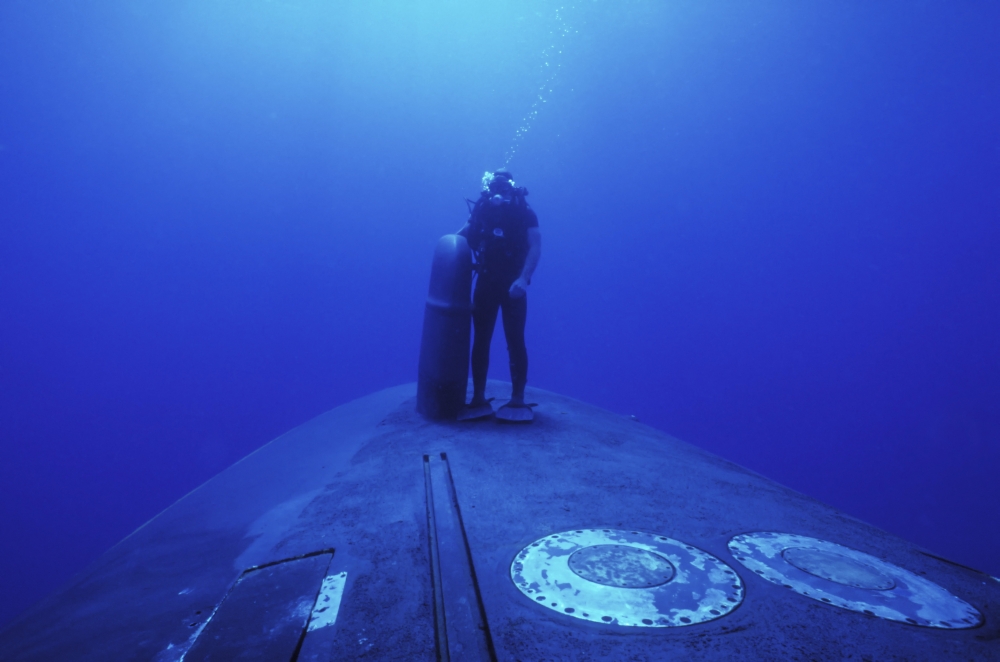 Picture of A Navy Seal Stands Next To The Wlr9 Sonar Dome On The Bow of The Uss Kamehameha While Underwater & Underway in The Clear Pacific Ocean Waters Off of Oahu Hawaii Poster Print, 17 x 11