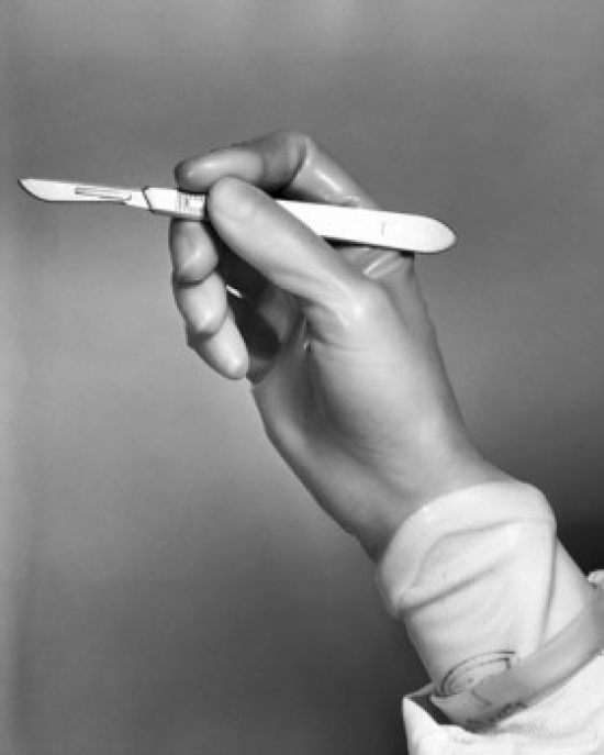 Surgeons Hand Holding A Scalpel Poster Print - 18 x 24