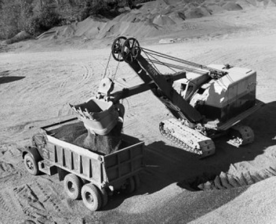 Excavator Loading Rock Dirt Into A Dump Truck Poster Print, 18 x 24