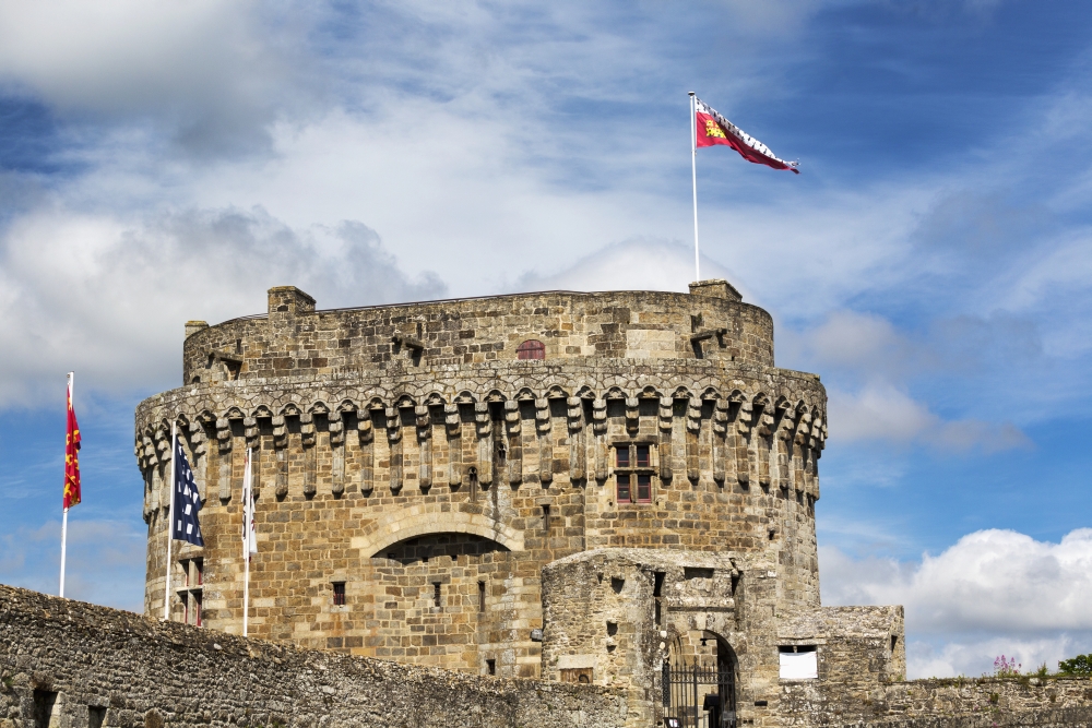 Large Stone Fort with Colourful Flags on Top with Blue Sky & Clouds - Dinan Brittany France Poster Print - 38 x 24 in. - Large