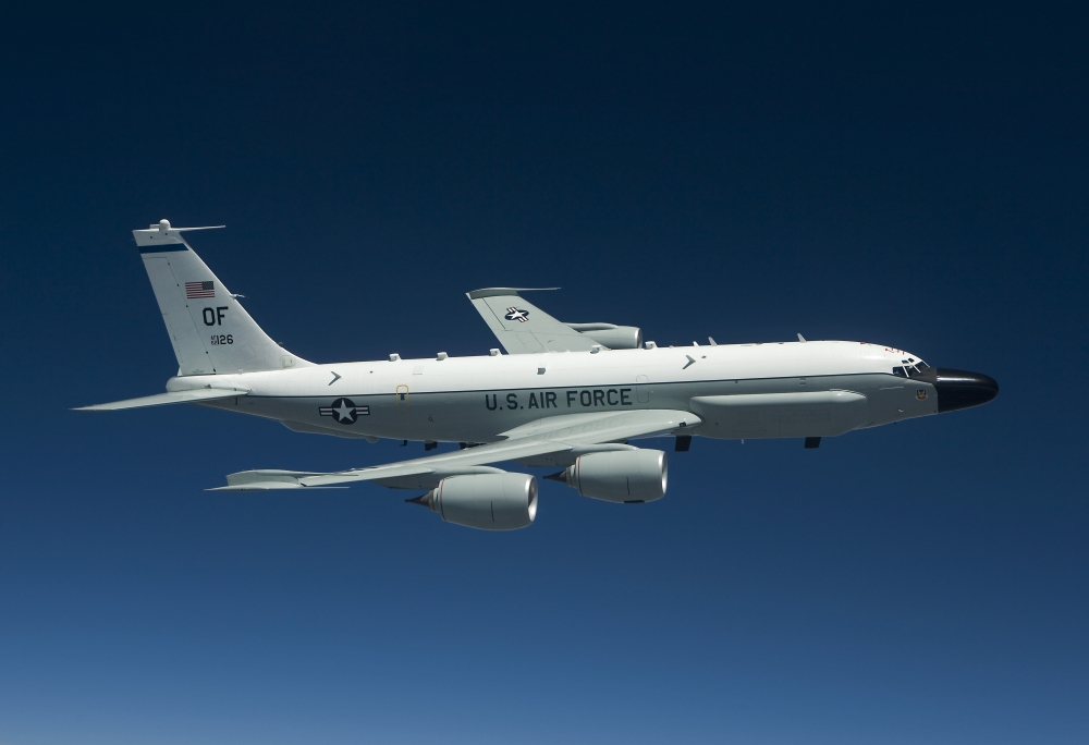 An Rc-135W Rivet Joint Aircraft Flies High Over The Midwest On A Training Mission Out of Offutt Air Force Base Nebraska Poster Print, 17 x 11