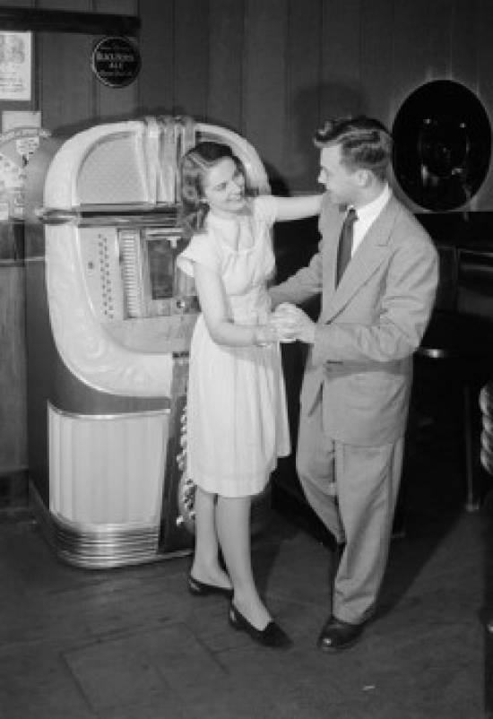 Young Couple Dancing by Jukebox in Bar Poster Print - 18 x 24