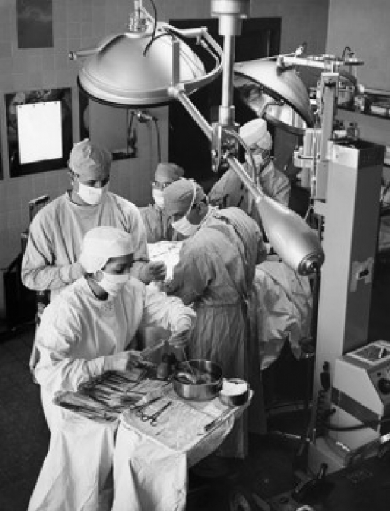 High Angle View of Surgeons Performing A Surgery in An Operating Room Poster Print