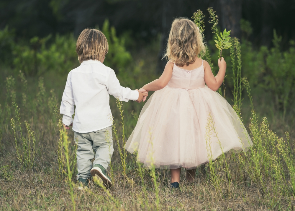 DPI12270868 A Young Boy & Young Girl Holding Hands & Walking Through A Field - Tarifa Cadiz Andalusia Spain Print - 18 x 13 in.