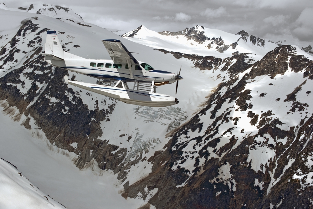 Picture of Design Pics DPI2264112 Cessna Caravan Amphibian Seaplane Flying Through The Coast Mountains - British Columbia Canada Poster Print, 19 x 12