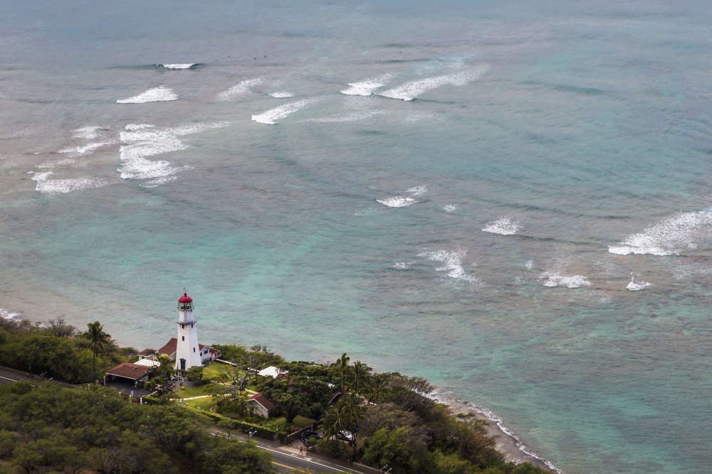 View of Diamond Head Lighthouse with Waves Breaking in The Shallow Water in Background Poster Print - 38 x 24 in. - Large