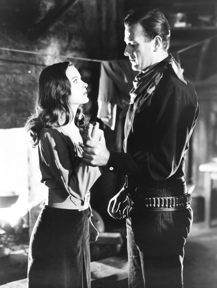 Everett Collection EVCMBDTAINEC035HLARGE Tall In The Saddle From Left - Ella Raines John Wayne 1944 Photo Print, 16 x 20 - Large