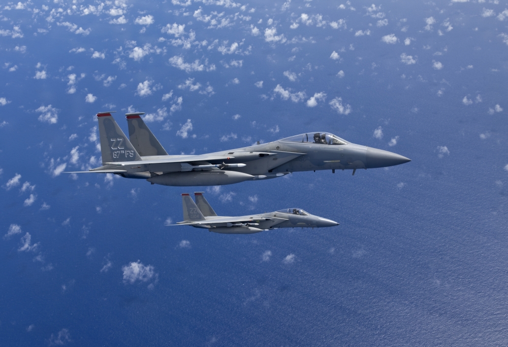 Two F-15 Eagles From The 18th Wing At Kadena Air Base Okinawa Japan Fly in Formation Over The Pacific Ocean Poster Print, 17 x 11