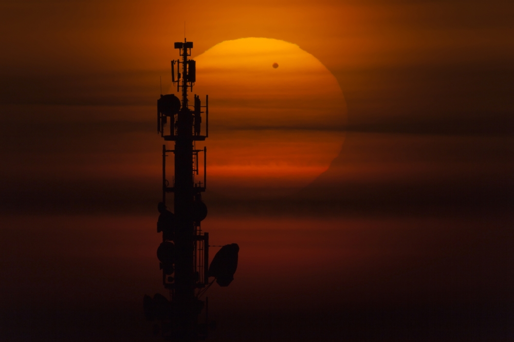 Transit of Venus Behind Communication Tower Leipzig Germany Poster Print - 17 x 11