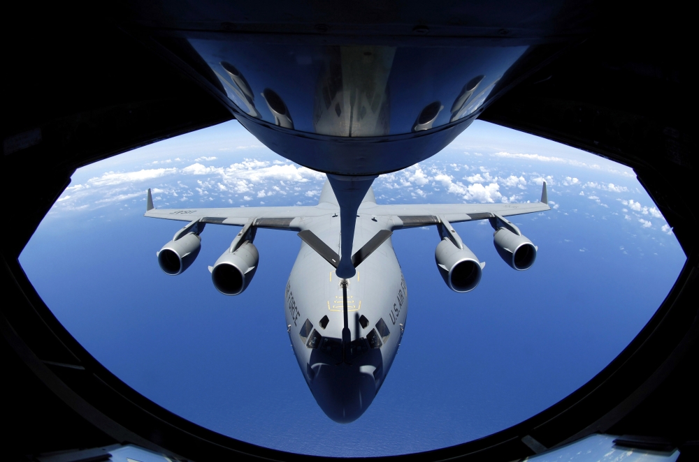 StockTrek Images PSTSTK102515MLARGE June 18 2007 - A C-17 Globemaster III Receives Fuel From A Kc-135 Stratotanker Poster Print, 33 x 22 - Large