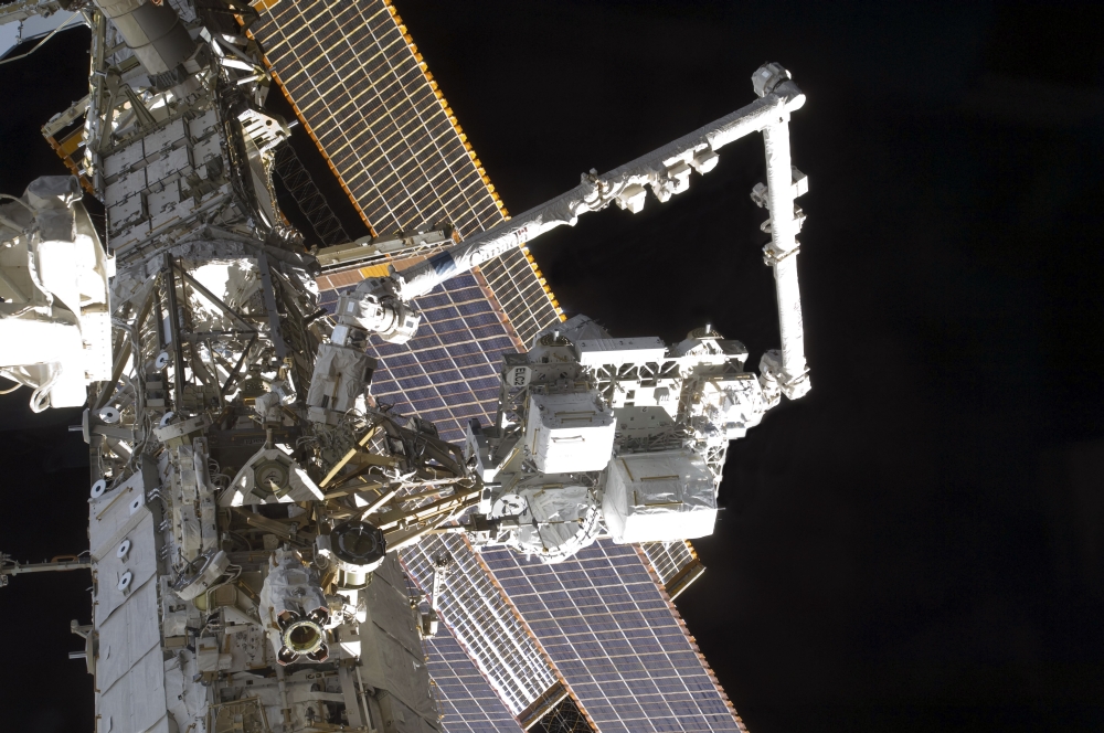 The Canadarm2 Mates The Express Logistics Carrier To The Outboard Payload Attachment System Poster Print, 34 x 22 - Large
