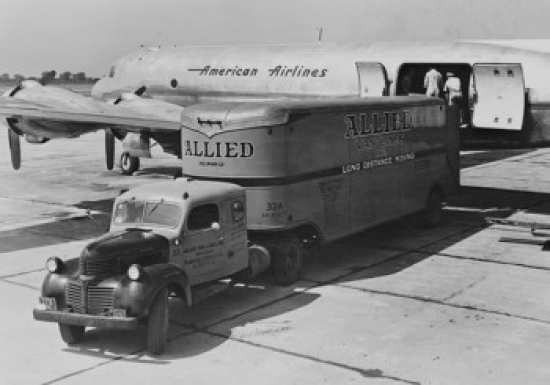 Superstock SAL255423098LARGE Freight Being Unloaded From Moving Truck Onto American Airlines Plane Poster Print, 24 x 36 - Large