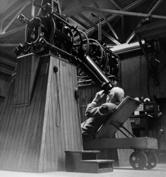 Man Looking Through An Astronomy Telescope Poster Print - 18 x 24