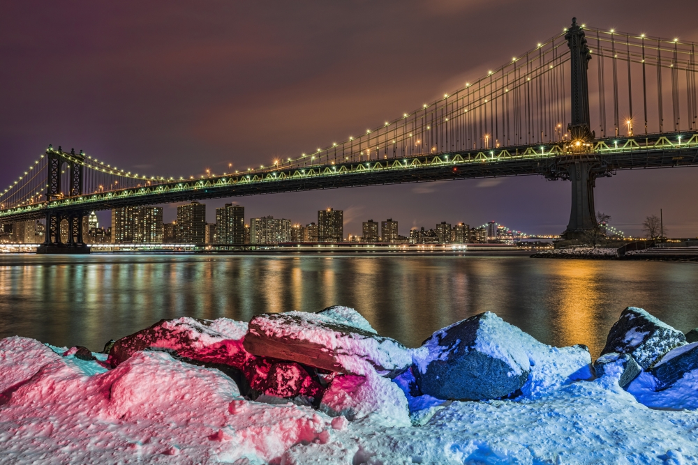 Manhattan Bridge Poster Print by Snow-Covered Rocks at Sunset Brooklyn Bridge Park Brooklyn - 38 x 24 in. - Large