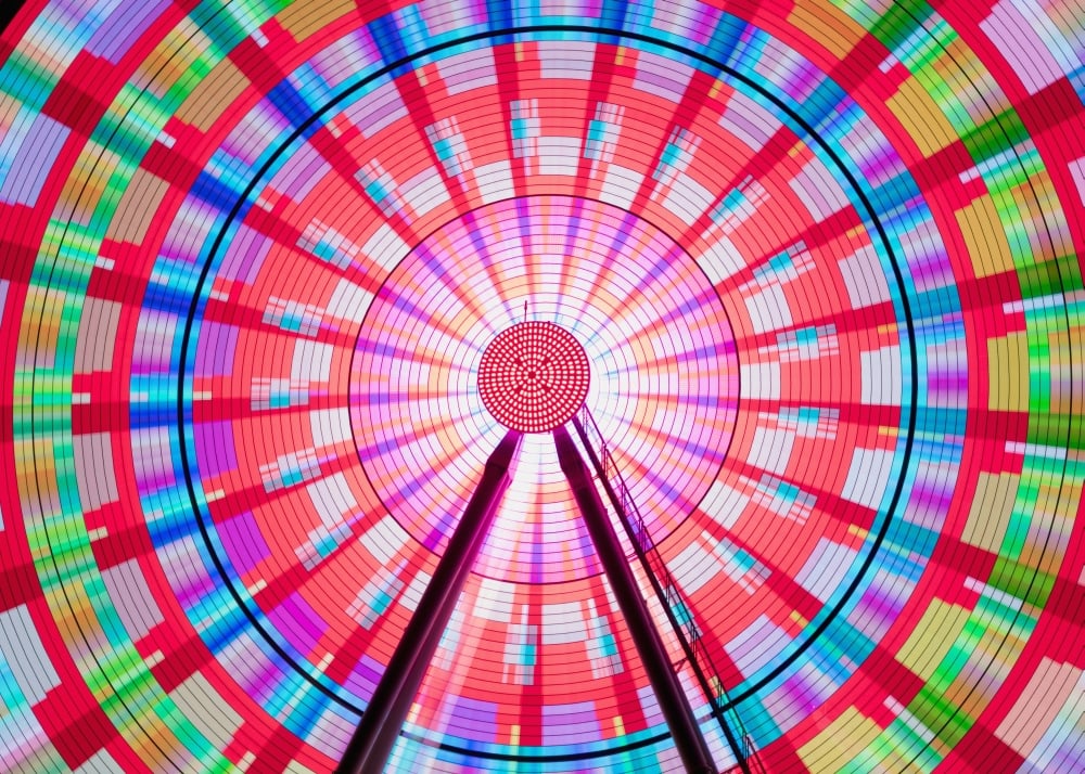 Long Exposure Photograph Showcasing The Many Color Combinations The Big Wheel Produces at Night - Seattle Washington 1 Poster Print - 19 x 13 in.