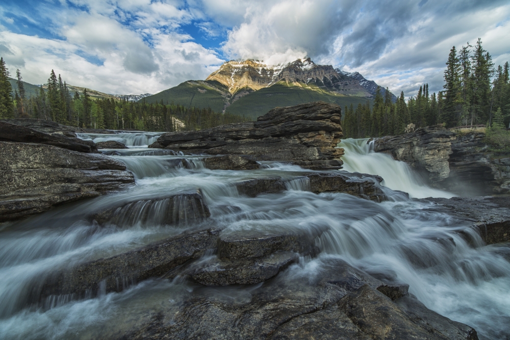 Late Afternoon Sun Lights Up Mount Fryatt As The Athabasca River Flows Over Athabasca Falls in Jasper National Park Poster Print - 19 x 12 in.