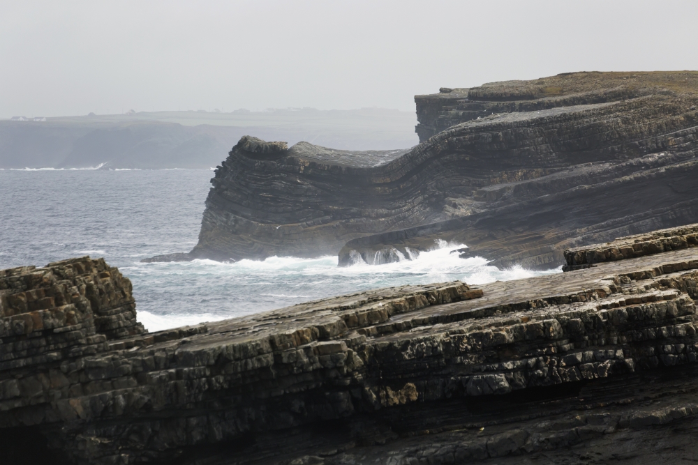 DPI12258603LARGE Rugged Dark Rocky Cliffs with Waves & Fogged Sky - Kilkee County Clare Ireland Poster Print - 38 x 24 in. - Large