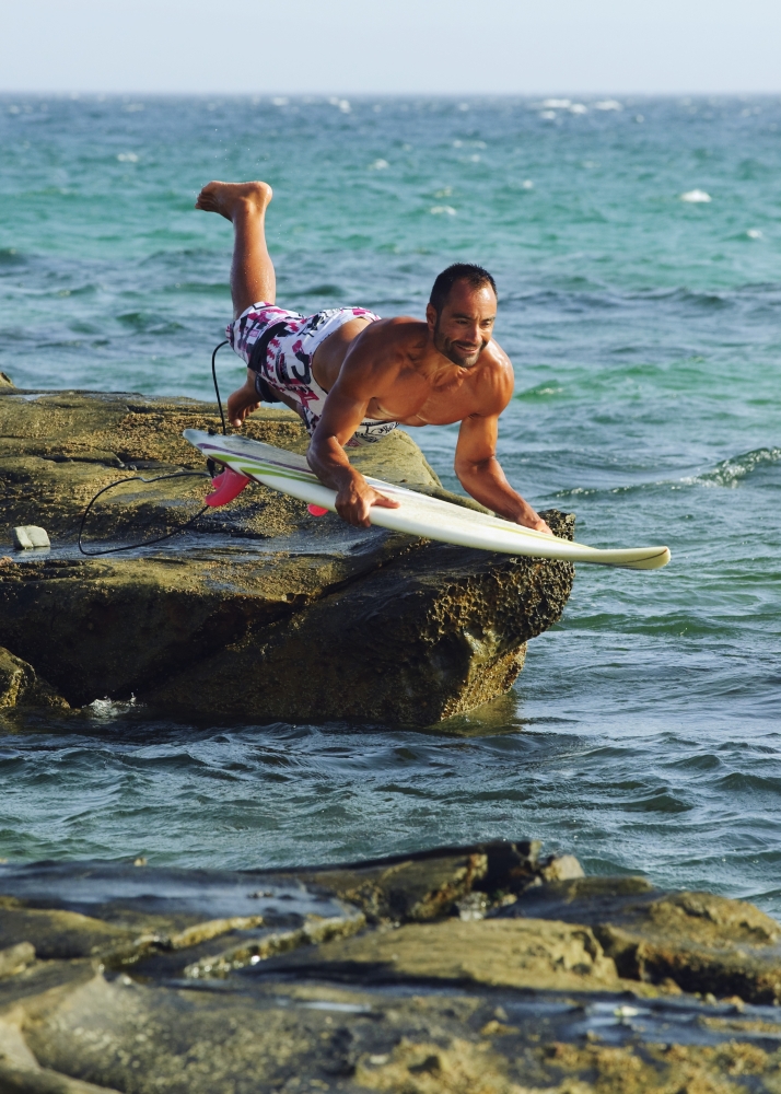DPI1864178LARGE Man Jumping Into the Water on His Surf Board Poster Print, 26 x 36