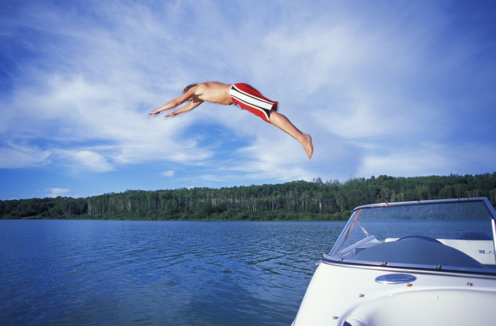 Diving Into A Lake Poster Print, 34 x 22