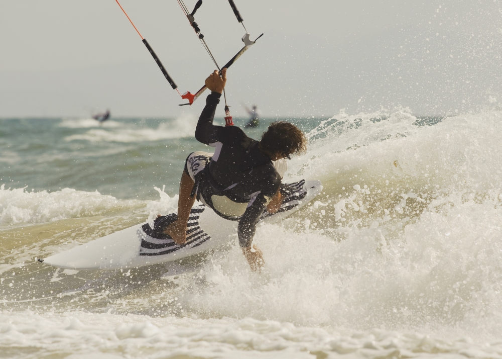 Kitesurfer Catching A Wave Poster Print - 18 x 13